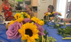 COA enjoys sunflowers with Suzie