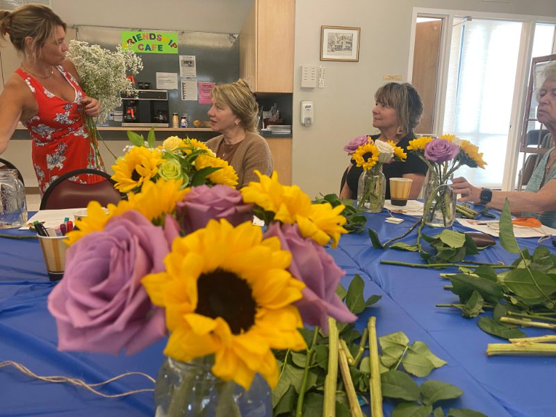 COA enjoys sunflowers with Suzie