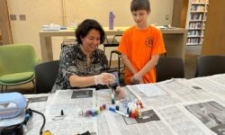 Local students craft Halloween jewelry