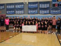 Warriors win in Dig Pink fundraiser