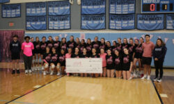 Warriors win in Dig Pink fundraiser