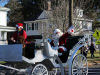 Santa parades through Walpole