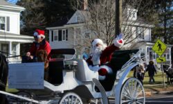 Santa parades through Walpole