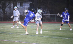 Boys’ lax fights hard versus Medfield
