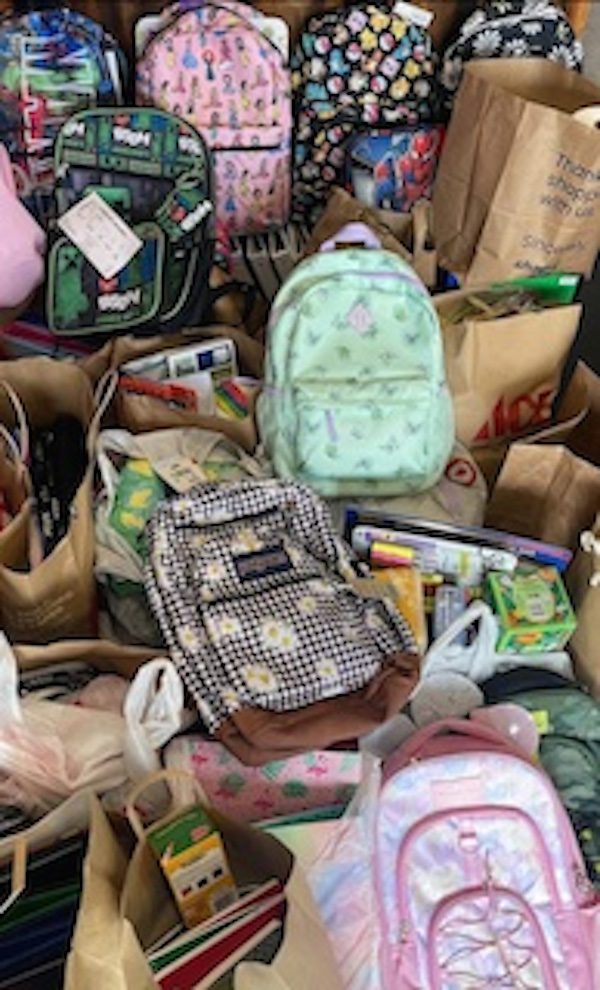 Medfield Village Cleaners runs school supply drive