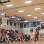Varsity boys’ basketball wins fourth game in a row