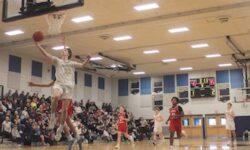Varsity boys’ basketball wins fourth game in a row