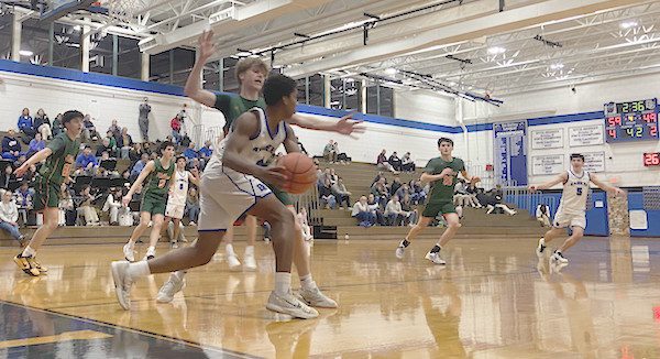 Boys’ basketball wins at home