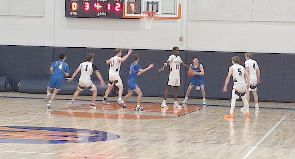 Boys’ hoop edged in fieldhouse opener
