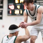 Boys’ Basketball Moves Into First