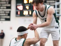 Boys’ Basketball Moves Into First