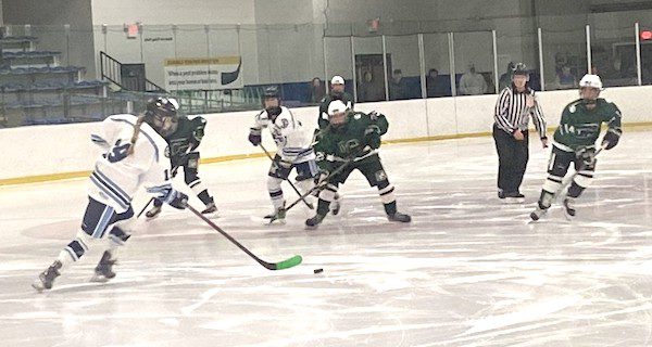 Girls’ hockey plays game for mental health awareness