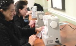 Residents Practice Sewing, Craft Neck Warmers at MPL