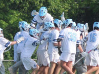 Girls’ tennis knocked out; boys’ lacrosse advances