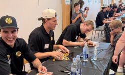Bruins players help kick-off summer reading